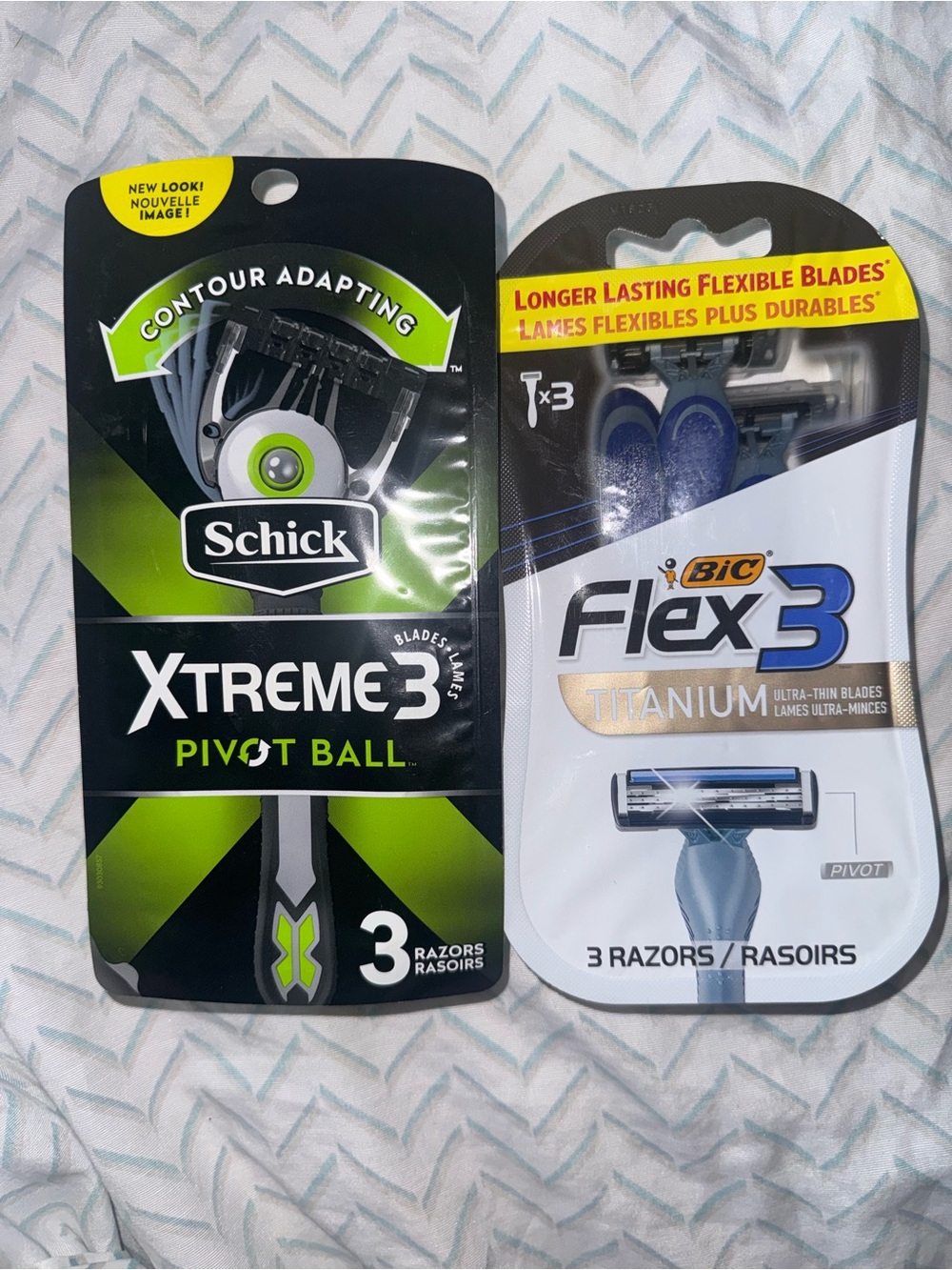 Two packs of men’s razors. Schick 3 pack and Bic flex 3 titanium